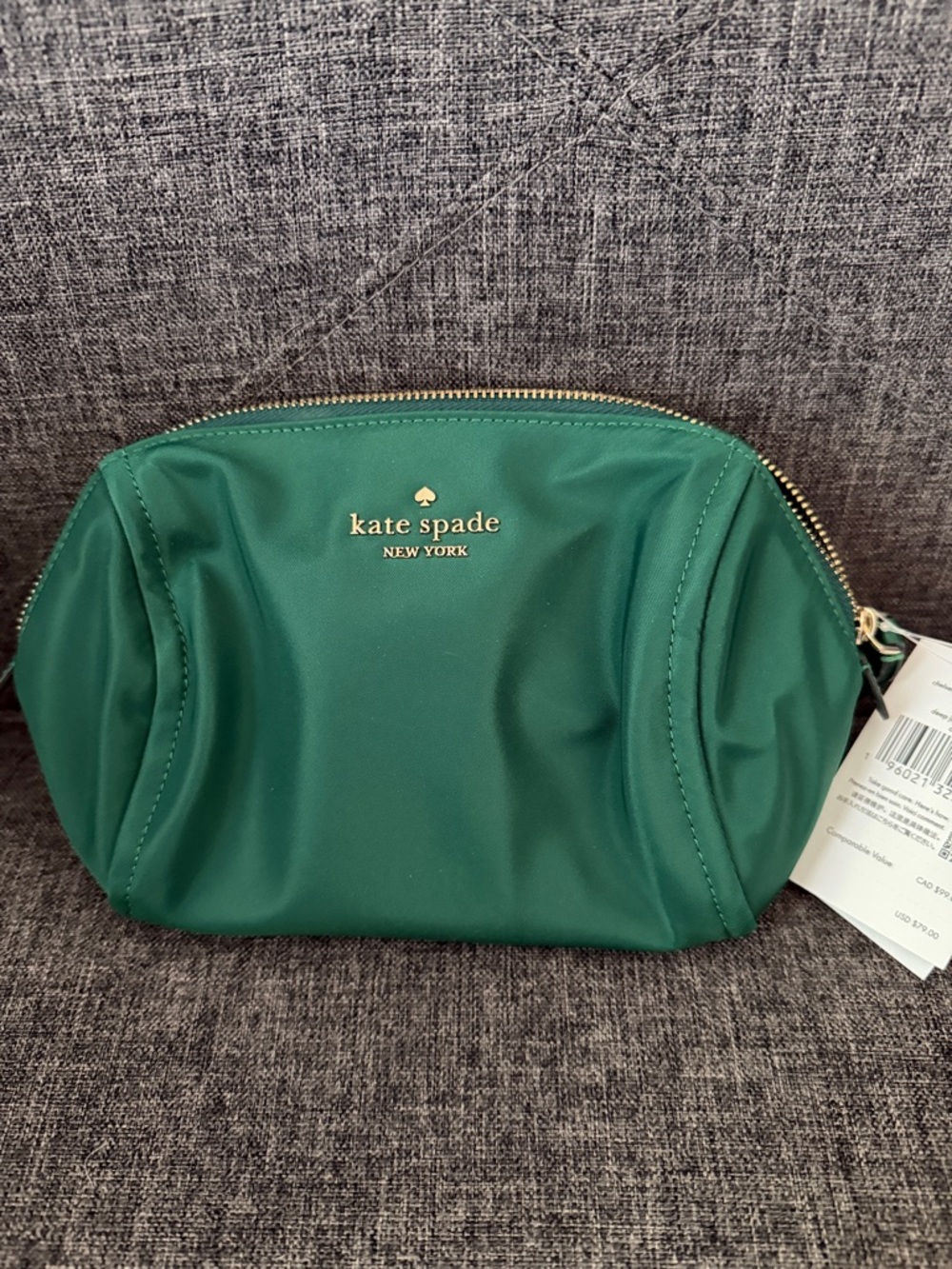 kate spade green nylon cosmetic pouch with gold logo